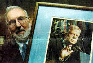 Stanley Godbold holds personally autographed photo of Jimmy Carter. Photo by Brian Allen Loden/SDN