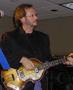 Gary Myers plays guitar