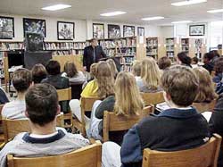 Paul Ruffin addresses students at Starkville High School during a visit in December, 2001