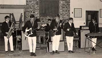 High school band The Groupe (above) played in 1968 at the American Legion Hut and included (left to right) Terry R. Hummer, sax (and a Mississippi poet today); Louis Portera, bass guitar; drummer Bobby Mann; Robert (Doc) Holiday, lead guitar; Ronnie Sennet, singer; and Billy Portera, keyboard.
